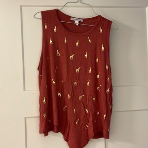 used large womens burnt orange tank top with gold giraffe (runs small)